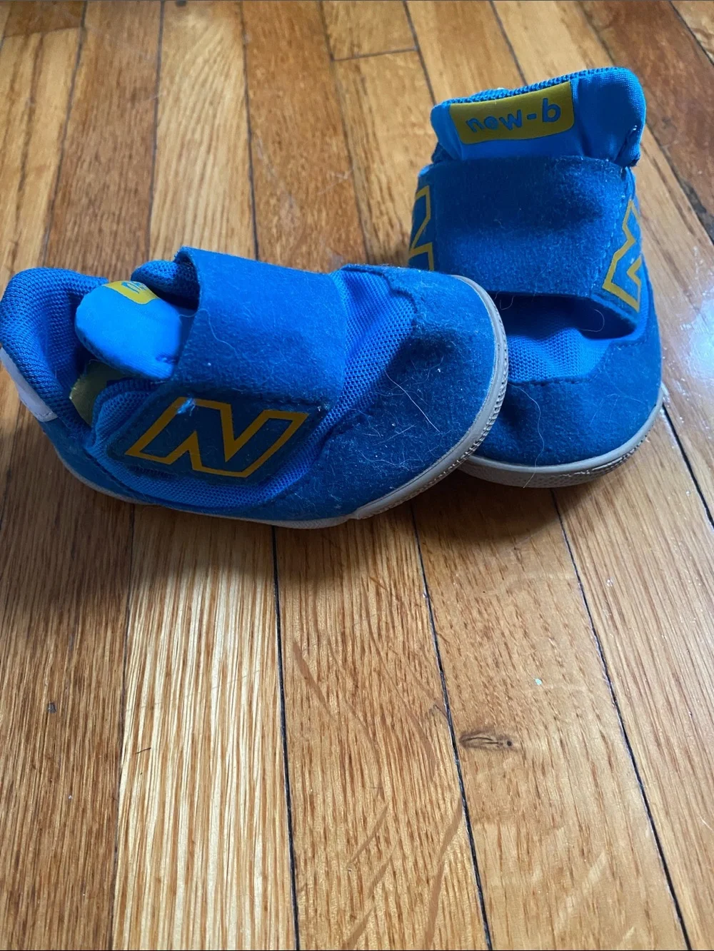 New Balance Bright Blue Velcro Toddler Sneakers with Yellow Accents